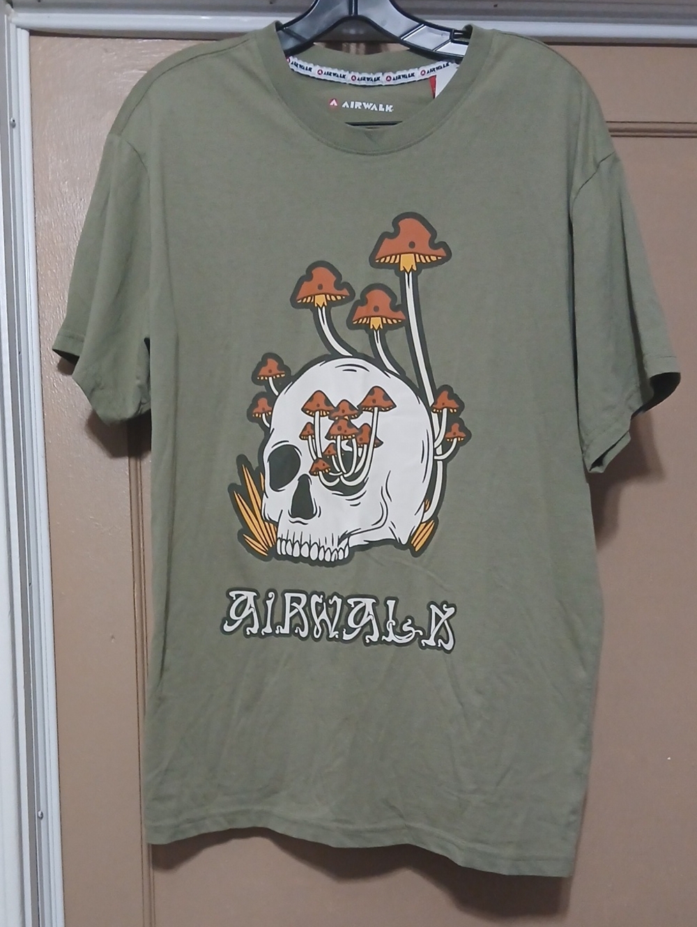 Airwalk Olive Green Tee with White Branded Neck Tape and Red Tag
